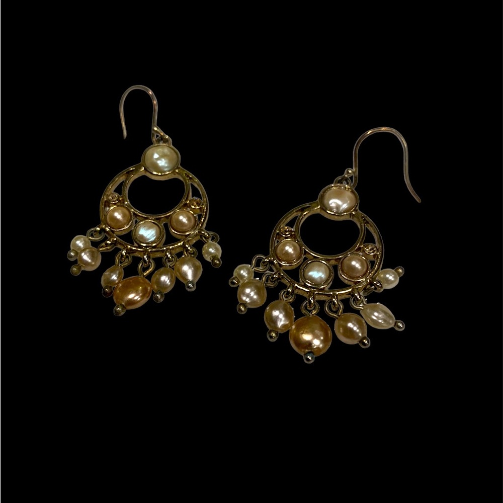 Accessorize with class! Pink and cream pearl dangle earrings in a gold setting